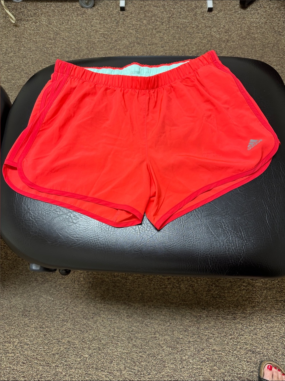 Adidas Women’s Performance Running Shorts Orange in color 4” length
